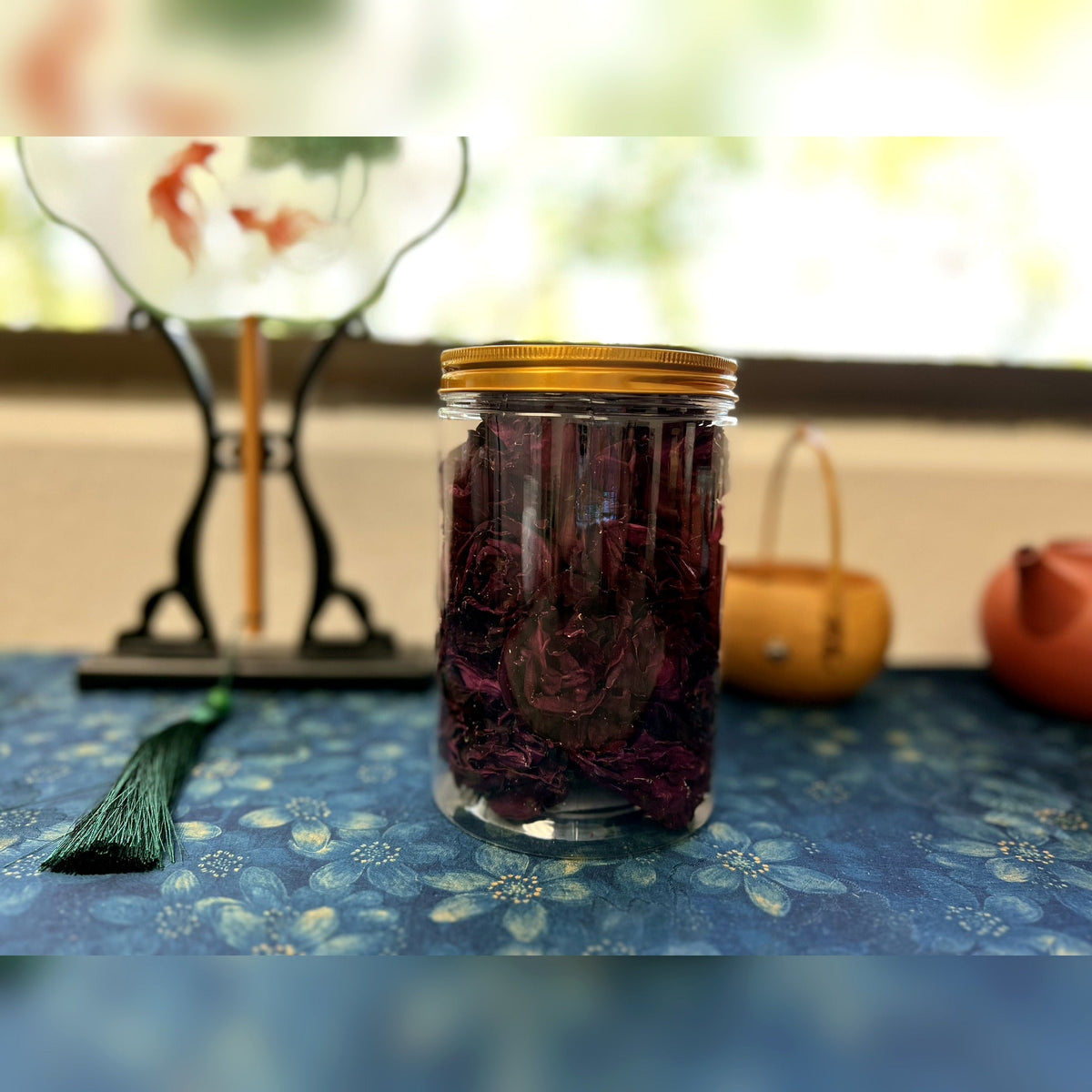 Freeze-dried Ink Red Roses 30g jar on a tea table